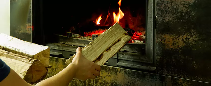 Wood Stove Heat Resistant Wall Repair in Boisbriand, Quebec